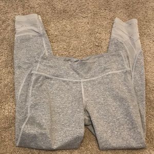 Gray athleta girl leggings size large with mesh on bottom